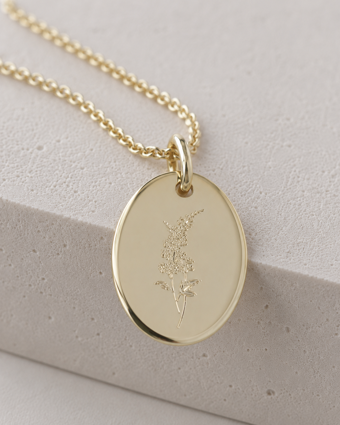 The Glow Juli Geburtsblumen-Kette als freigestelltes Produktbild